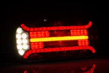 Load image into Gallery viewer, FT610 DI L Universal LED rear lamp with reflective triangle 6-functional.
